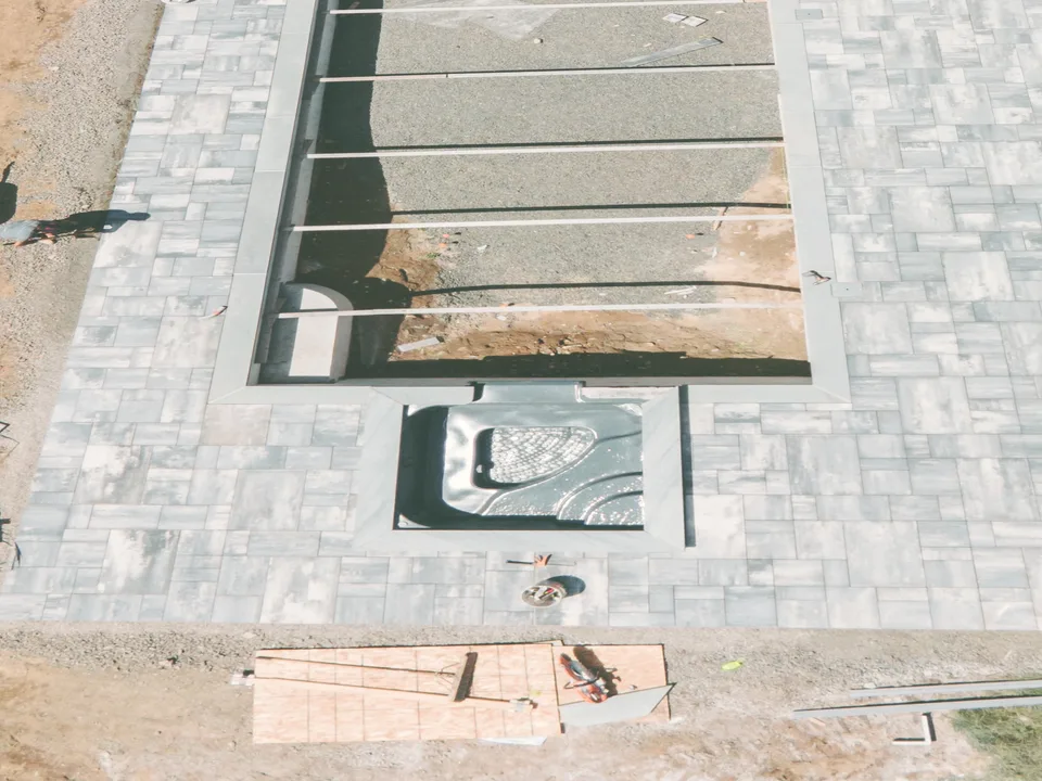 Aerial — pool shell and spa under construction, deck laid — Exterior Services LLC, Wilton, CT