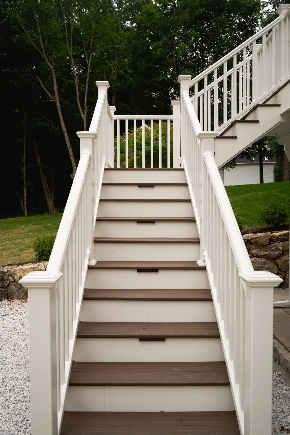 Composite stair run between white rails — Exterior Services LLC, Ridgefield, CT