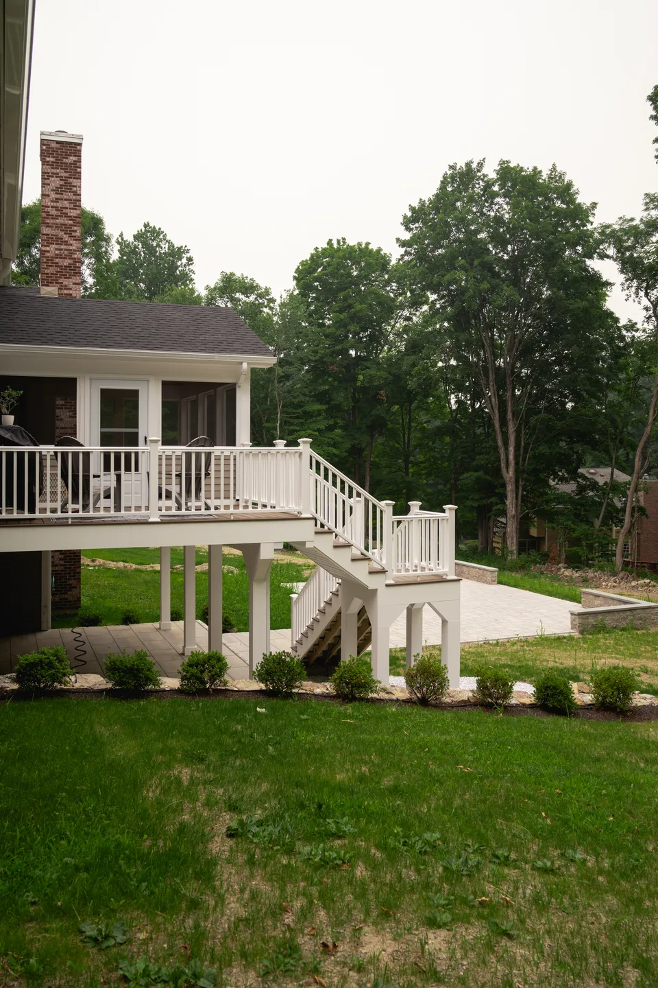 Composite deck and stair tower on a finished lawn — Exterior Services LLC, Ridgefield, CT
