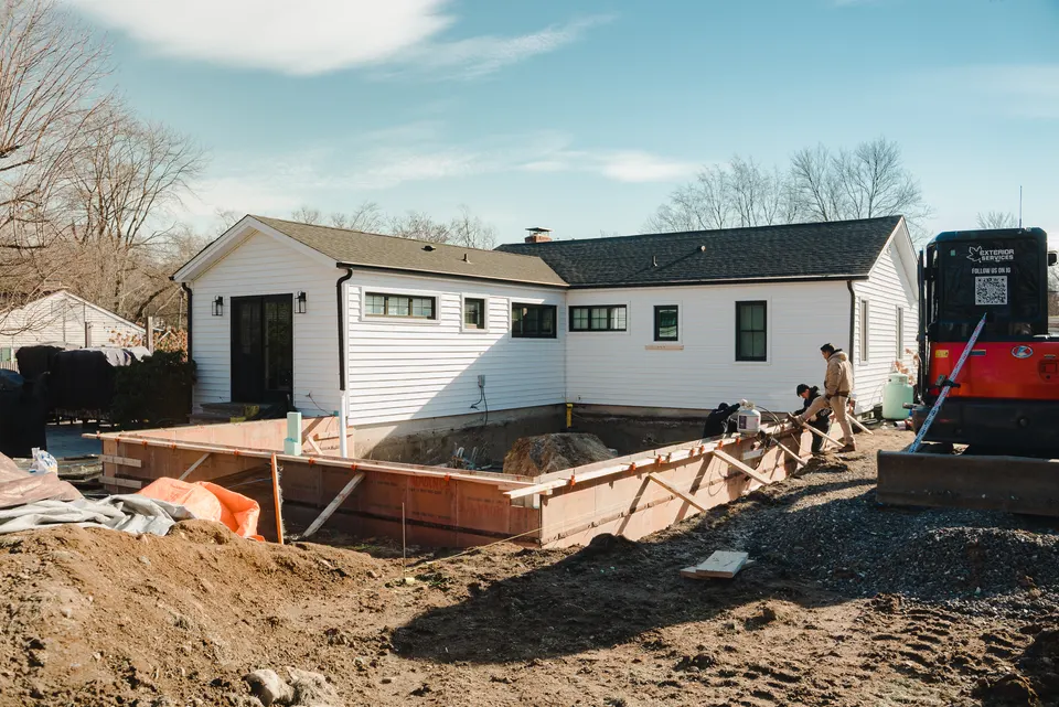 Footing forms and the concrete truck arriving — Exterior Services LLC, Bethel, CT