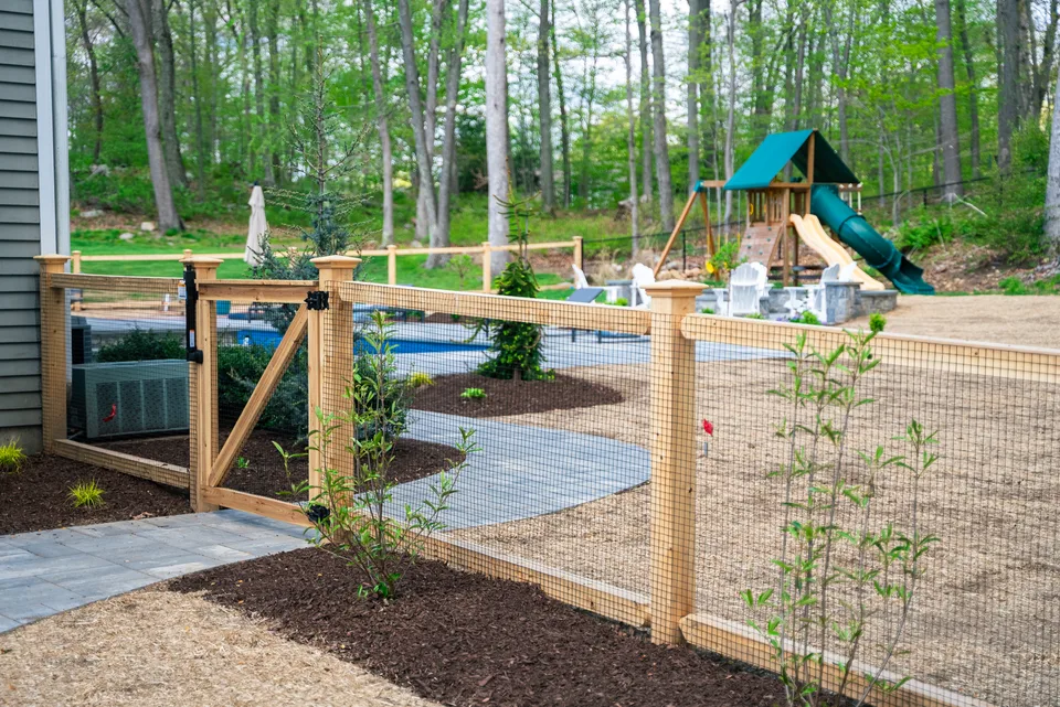Cedar post-and-rail with wire mesh, and the gate — Exterior Services LLC, Newtown, CT