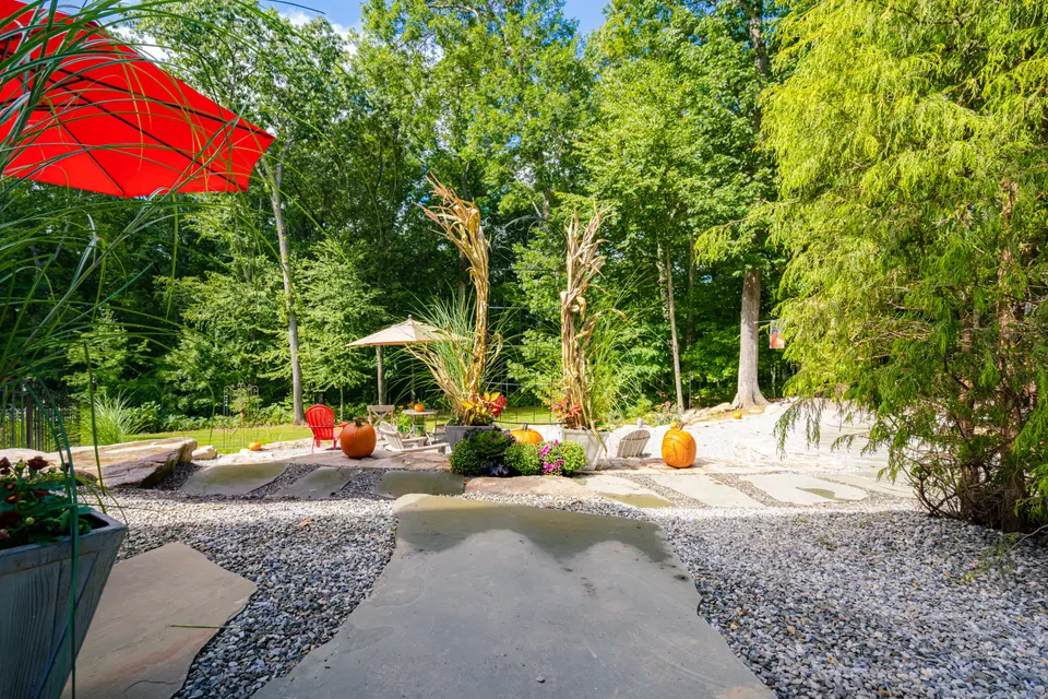 Natural boulder terrace and gravel patio — Exterior Services LLC