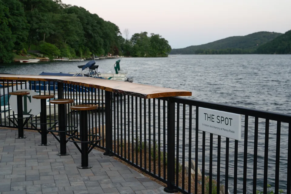 Paver terrace + railing above the water, "The Spot" — Exterior Services LLC