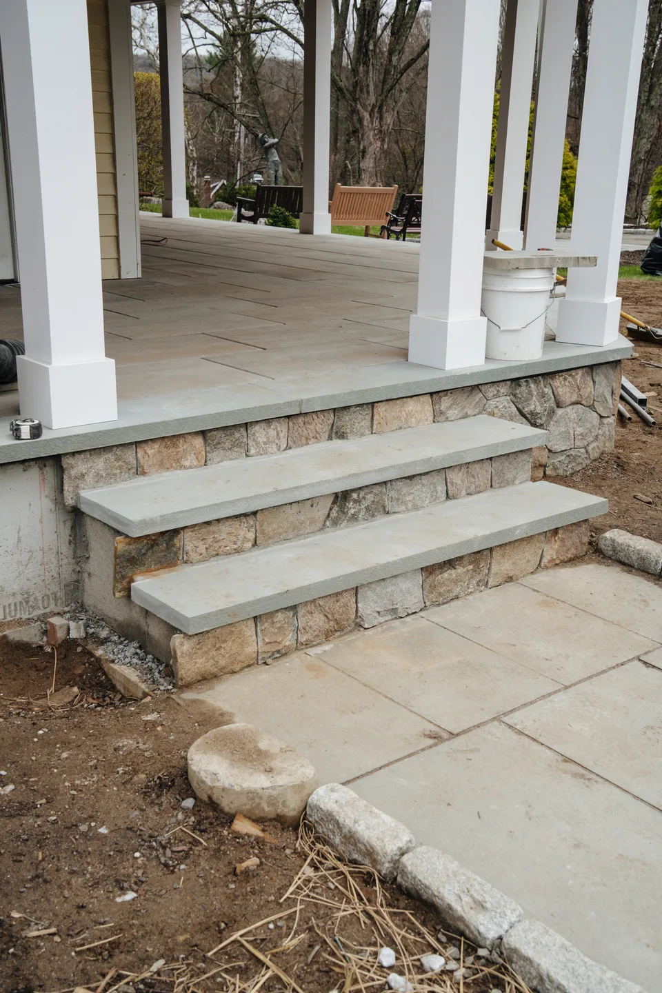 Finished granite steps in fieldstone veneer — Exterior Services LLC