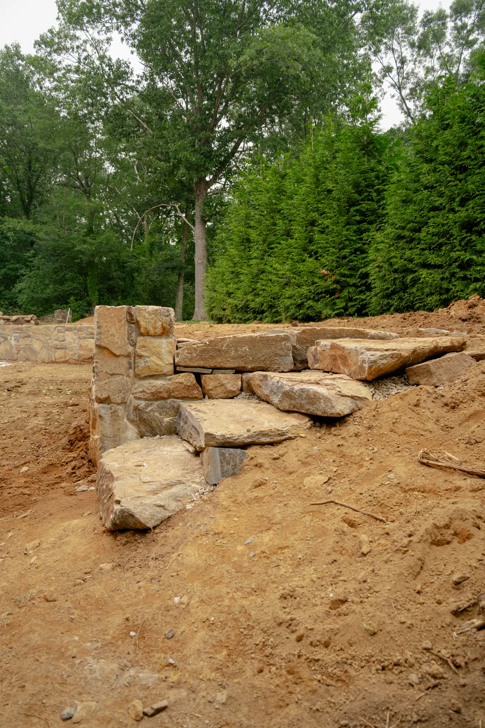 Setting boulder steps on the new grade — Exterior Services LLC, Danbury, CT
