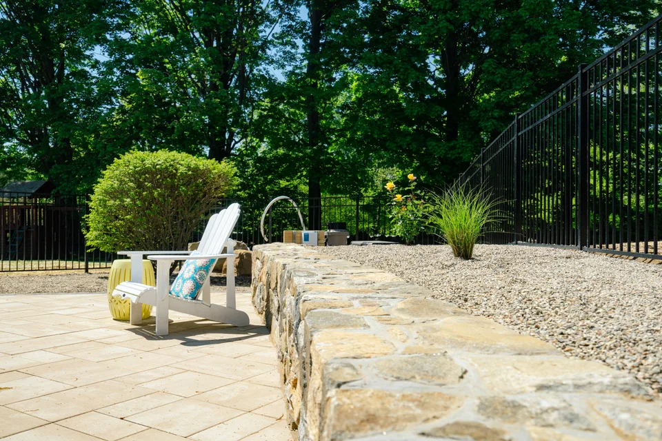 Stone seat wall at the deck edge — Exterior Services LLC