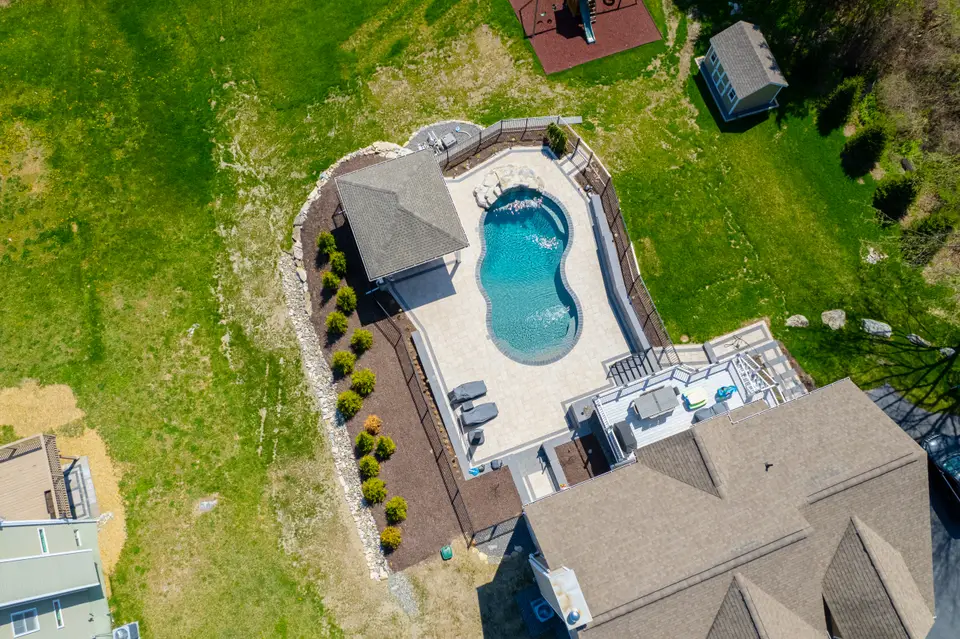 Aerial — pool open, pavilion and terraces, full colour — Exterior Services LLC, Stormville, NY