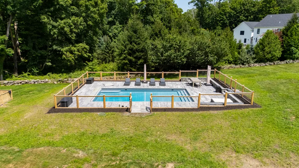 Aerial — rectangular pool, bluestone deck, cedar and wire fence — Exterior Services LLC, Redding, CT