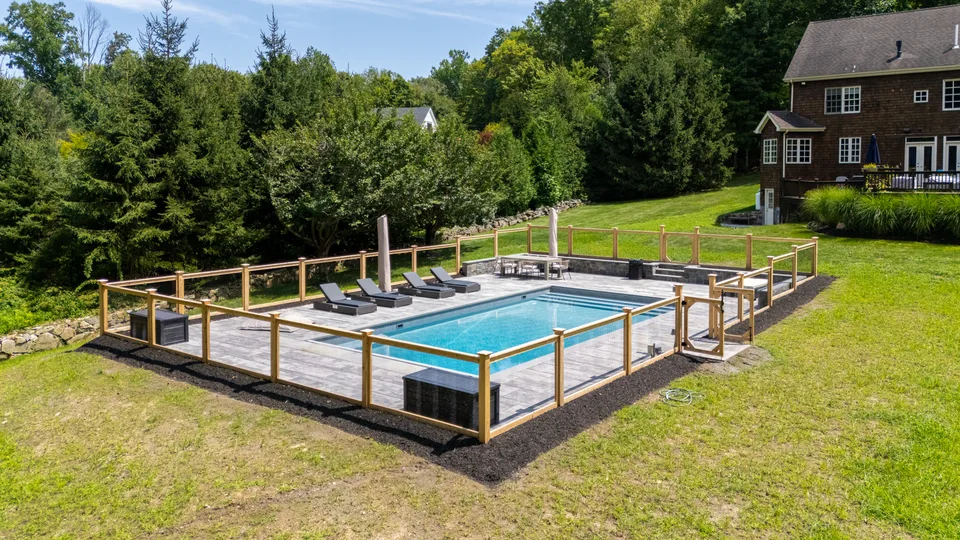 Aerial — rectangular pool, bluestone deck, cedar and wire fence — Exterior Services LLC, Redding, CT