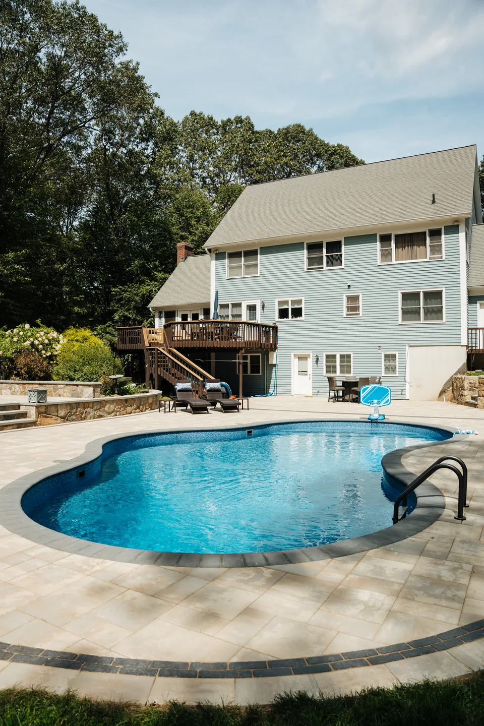 Pool and house with stone retaining walls — Exterior Services LLC, Bethel, CT