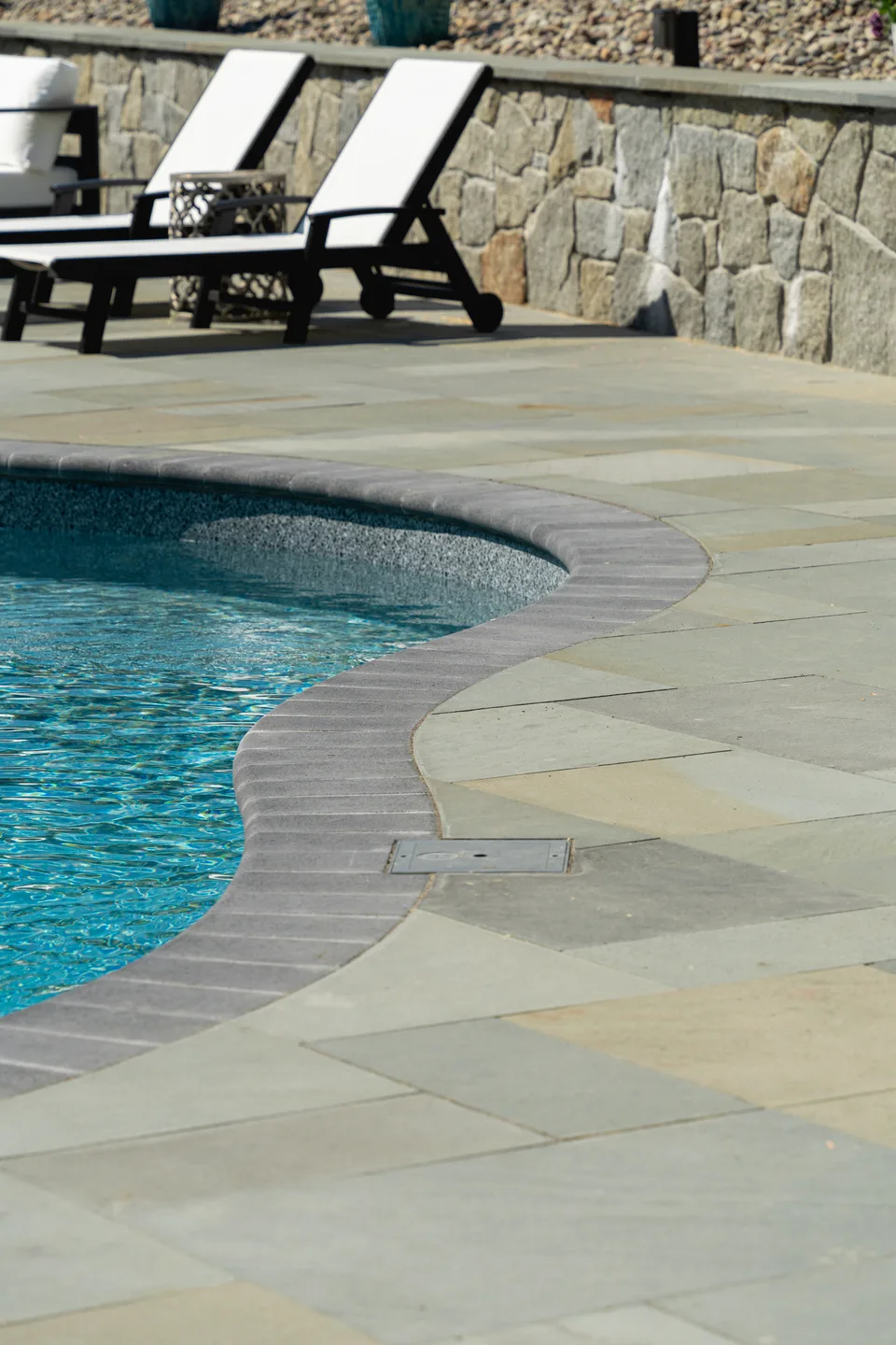Pool coping and bluestone deck with loungers — Exterior Services LLC, Newtown, CT